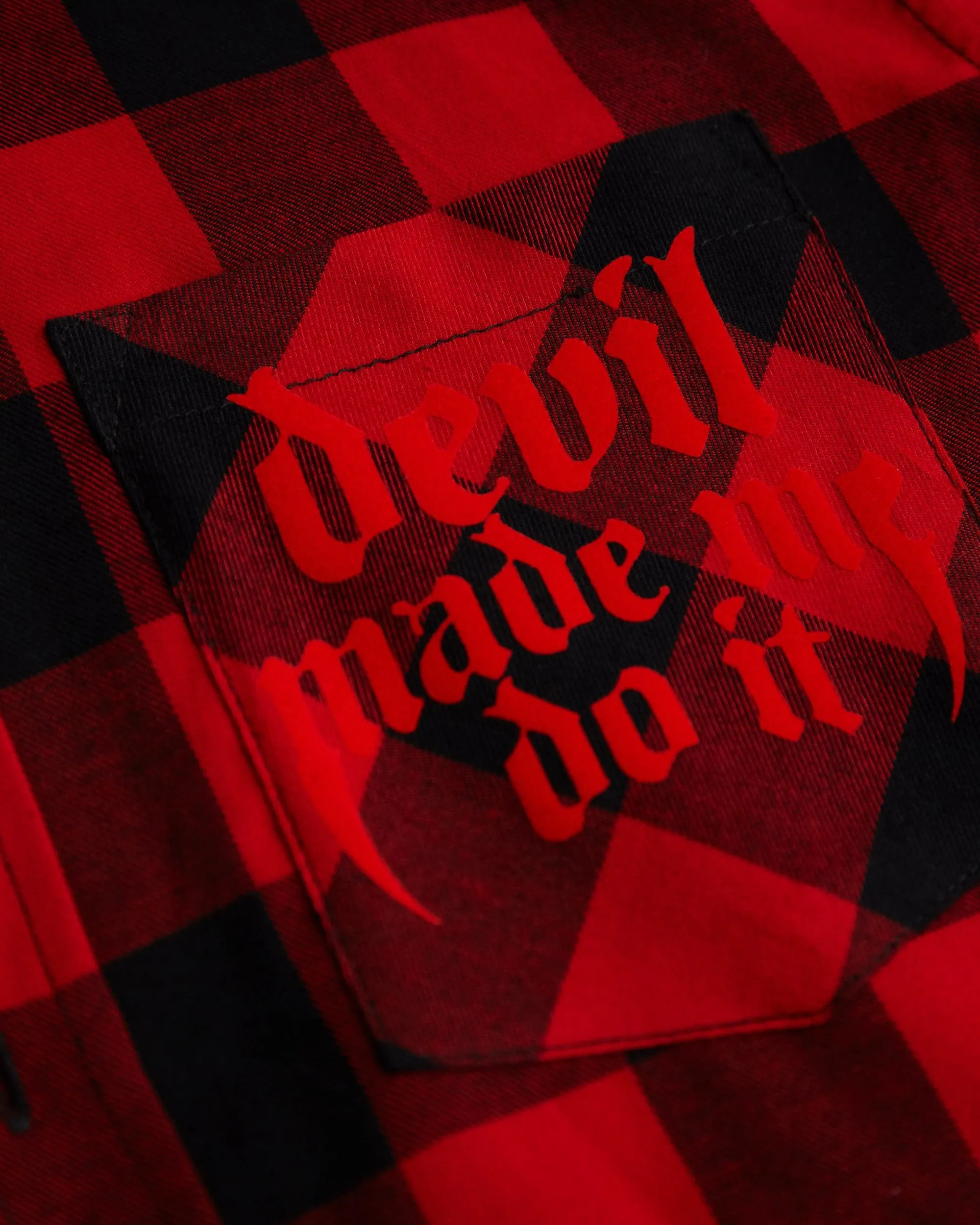 Devil made me do it, red flock on sleeveless checked flannel shirt